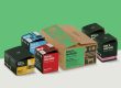 Variety of Bold By Nature Products set out over a green background